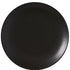 A simple matte black round plate shown from a top-down view on a solid white background.